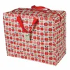 A large storage bag with a vintage apple pattern and red handles. Produktbild-Vorschau