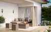 An outdoor patio area with a wicker lounge set. Produktbild-Vorschau