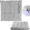 A striped seat cushion is shown from multiple angles. Anteprima dell’immagine prodotto