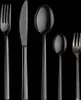 A set of cutlery on a black background. Produktbild-Vorschau