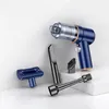 A blue and transparent handheld vacuum cleaner with several attachments displayed on a white and light gray surface. Náhled obrázku produktu