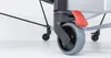 A close-up view of the wheels and braking mechanism of a table tennis table. Produktbild-Vorschau