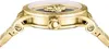 A close-up side view of a gold watch. Náhľad obrázku produktu