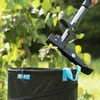 A weed remover is shown being used to pick up weeds and place them into a black bin. Produktbild-Vorschau