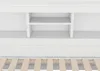 A close-up, top-down view of a white daybed with built-in storage shelves and drawers. Podgląd zdjęcia produktu