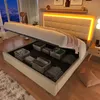 A bedroom scene at night with a bed that has storage underneath and LED lighting. Náhľad obrázku produktu