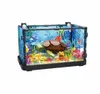 A toy aquarium with a turtle, fish, and coral made of building blocks. Náhľad obrázku produktu