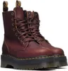 A pair of Dr. Martens boots on a white background. Produktbild-Vorschau