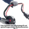 A close-up shot of a person's hands wearing gloves, holding the handle of a lawnmower. Produktbild-Vorschau