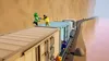 Characters from the game Gang Beasts are on top of a moving train, with a canyon-like landscape in the background. Náhled obrázku produktu