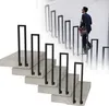 A man in a suit walks up a modern staircase with minimalist railings, suggesting a stylish and functional interior design. Náhľad obrázku produktu