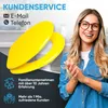 A woman is smiling and clapping her hands in front of a yellow toilet seat. Text overlays provide customer service information and company details. Produktbild-Vorschau
