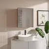 A modern bathroom vanity with a sink, faucet, and a mirror cabinet. Náhľad obrázku produktu