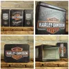 A collage of four images showing Harley-Davidson branded metal tins, with some showing the product's exterior and one showing the interior. Produktbild-Vorschau