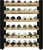A wooden wine rack filled with bottles of wine. Produktbild-Vorschau