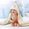 A happy baby wrapped in a hooded towel. Náhľad obrázku produktu