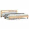 A wooden bed frame with a headboard and mattress, shown from a side angle against a white background. Podgląd zdjęcia produktu