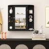 A black wall-mounted cabinet with a mirror and shelves, decorated with various items, is shown above a black cabinet. Náhľad obrázku produktu