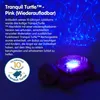 A pink tranquil turtle night light is shown with blue light projections on a dark blue background. Text describes the product's features and anniversary. Podgląd zdjęcia produktu