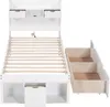 A white bed frame with wooden slats and drawers, shown with one set of drawers pulled out. Podgląd zdjęcia produktu