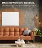A living room scene with a sofa, coffee table, and a heating panel on the wall. Anteprima dell’immagine prodotto