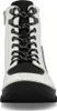 A close-up, front-facing view of a white and black women's boot. Náhled obrázku produktu