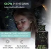 A young girl sleeping in a bed with glow-in-the-dark bedding. The bedding has a heart pattern with birds and flowers. The image also shows a close-up of a pillow and a folded duvet cover. Produktbild-Vorschau
