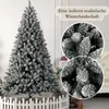 A realistic artificial Christmas tree with snow-like flocking, displayed indoors with close-up insets showing the detail of the branches. Produktbild-Vorschau