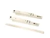 Three metal brackets, likely for mounting an air conditioner unit, are arranged on a white background. Anteprima dell’immagine prodotto