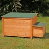 A wooden chicken coop with a green roof sits on a grassy lawn. Produktbild-Vorschau