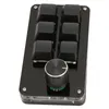 A black programmable keyboard with a rotary knob on a white background. Náhľad obrázku produktu