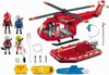 A collection of PLAYMOBIL rescue-themed toys, including a helicopter, boat, and figures, arranged on a white background. Náhľad obrázku produktu