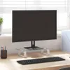 A monitor stand on a desk with a keyboard and a pen holder. Náhled obrázku produktu