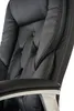 A close-up view of the backrest and armrest of a black office chair. Produktbild-Vorschau