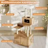 A multi-level cat tree with various features like a hammock, scratching posts, a feeding station, and a litter box enclosure, set in a home environment. Anteprima dell’immagine prodotto