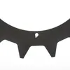 A close-up view of a black toothed wheel with a small hole in the center. Produktbild-Vorschau
