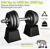 A pair of black dumbbells on black risers, with promotional text and graphics overlaid. Produktbild-Vorschau