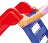 Hands assembling a red and blue plastic slide. Anteprima dell’immagine prodotto