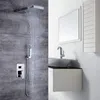 A modern bathroom with a shower system and a vanity with a sink and faucet. Produktbild-Vorschau