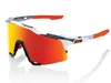 A pair of sports sunglasses with a white frame and red mirrored lenses, set against a white background. Náhled obrázku produktu