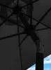 Close-up view of the mechanism and spokes of a dark gray umbrella, with a blue sky and white clouds visible in the background. Produktbild-Vorschau