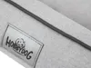 A close-up of a dog bed with a label. Náhled obrázku produktu