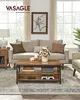 A living room scene with a couch, coffee table, and side table. Náhled obrázku produktu