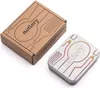 A cardboard box and a metal tin containing cutlery, both with branding and illustrations. Náhľad obrázku produktu
