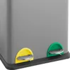 A close-up view of the bottom section of a gray trash can, showing two pedal-operated openings, one with a yellow rim and the other with a green rim. Voir les images du produit