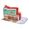 A toy fire station with Christmas decorations. Produktbild-Vorschau