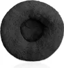 A round, fluffy, dark gray pet bed is shown from a top-down perspective against a white background.