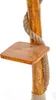 A close-up view of a wooden pole with a rope wrapped around it and a small wooden shelf attached. Anteprima dell’immagine prodotto