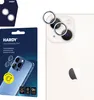 A product shot featuring packaging and a close-up of the product's camera lens protectors on a phone. Náhled obrázku produktu