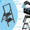 A black folding step stool with two steps and a handrail, shown with callouts highlighting its features. Náhled obrázku produktu